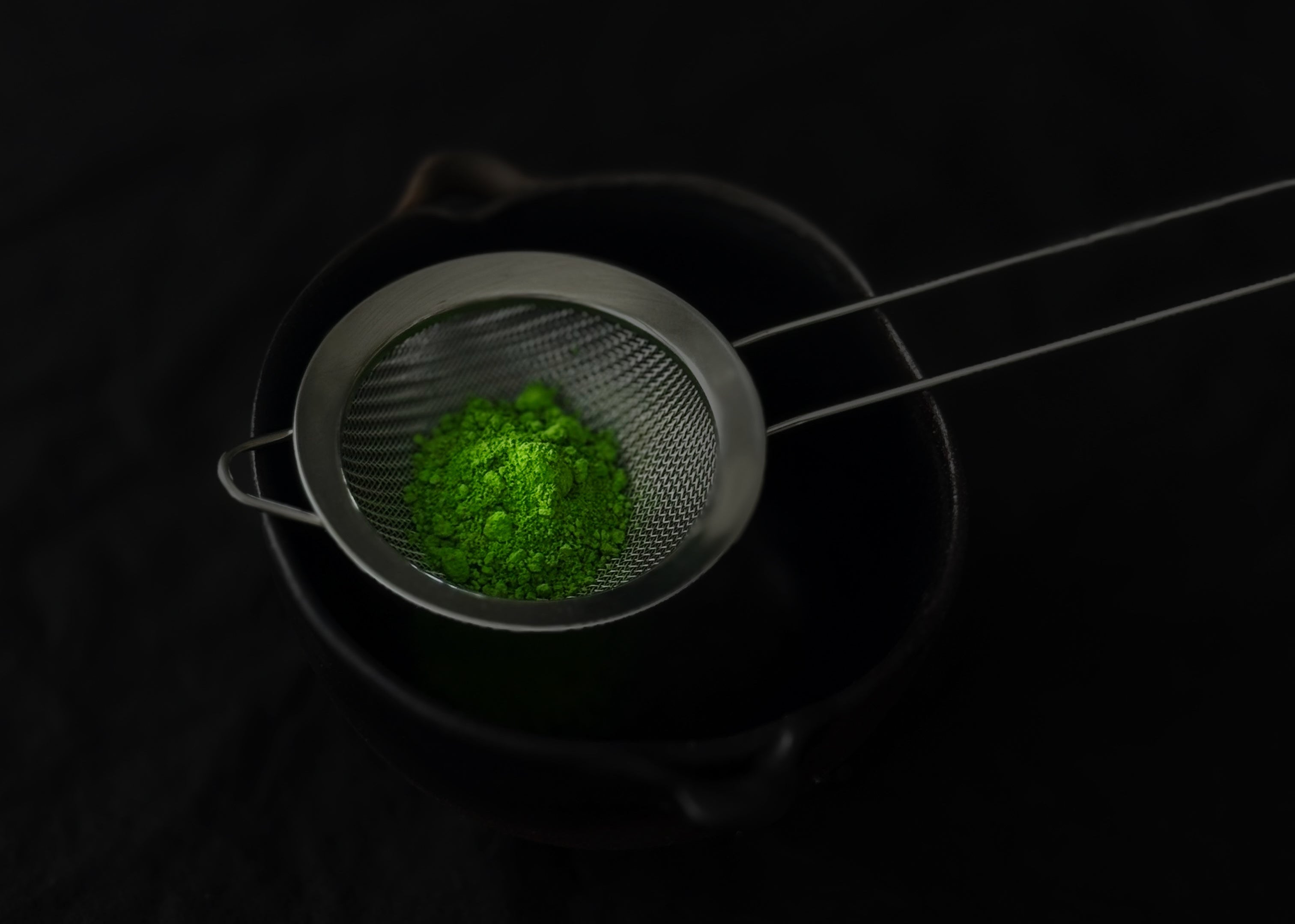 Ceremonial matcha powder in metal sif